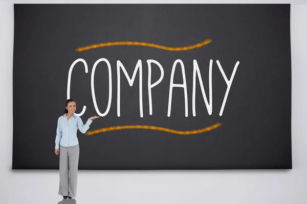 Businesswoman presenting the word company — Stock Photo, Image