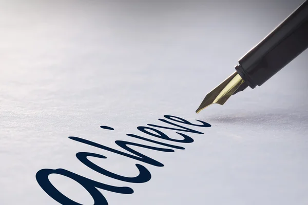 Fountain pen writing - Achieve — Stock Photo, Image