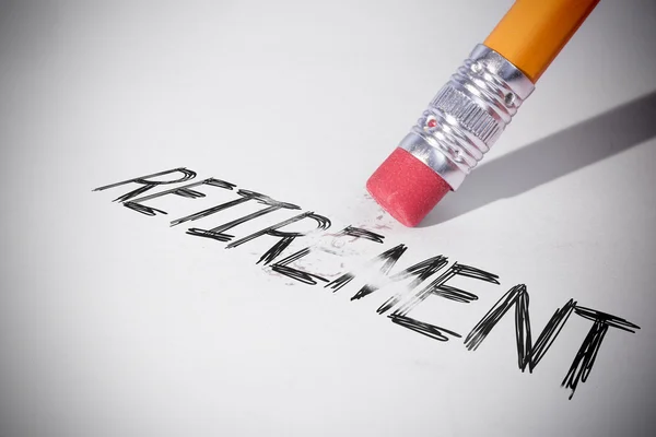 Pencil erasing the word retirement — Stock Photo, Image