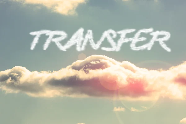 Transfer - against bright blue sky with cloud — Stock Photo, Image