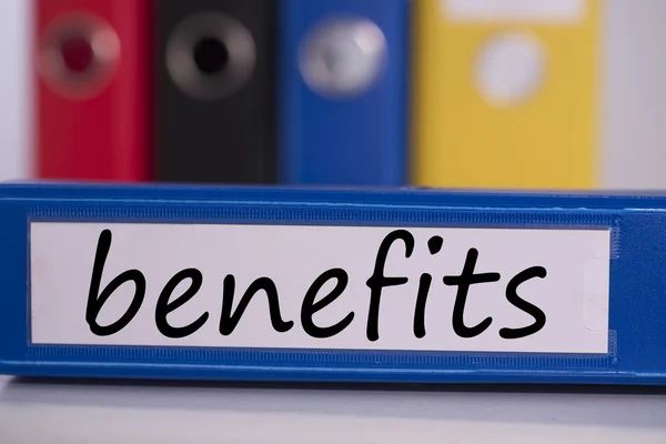 Benefits on blue business binder — Stock Photo, Image