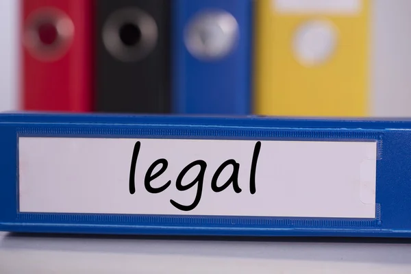 Juridische op blauwe zakelijke binder — Stockfoto