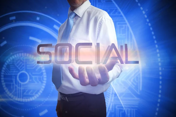 Empresário apresentando a palavra social — Fotografia de Stock