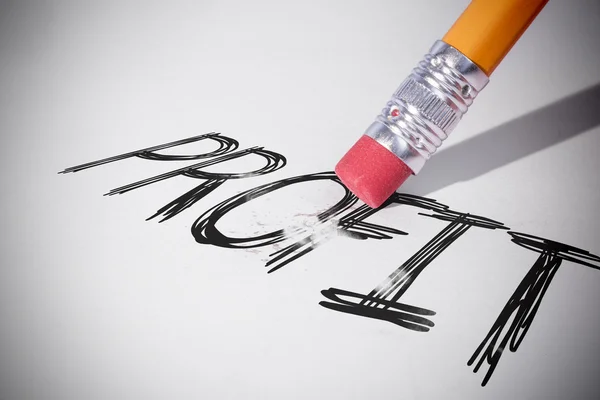 Pencil erasing the word Profit — Stock Photo, Image