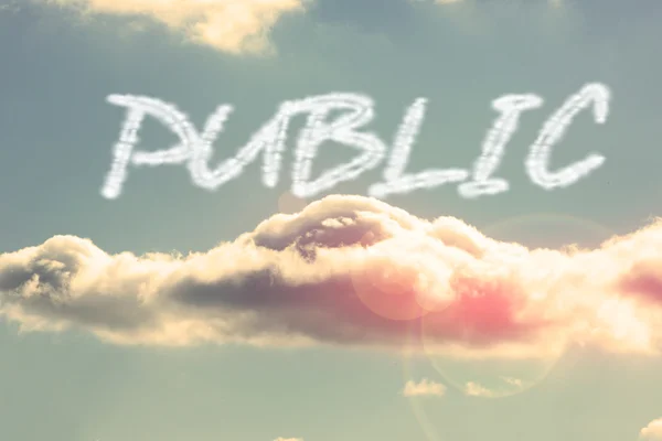 Public - against bright blue sky with cloud — Stock Photo, Image