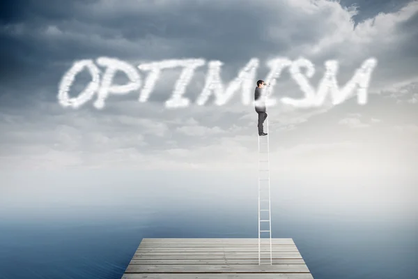 Word optimism and businessman — Stock Photo, Image