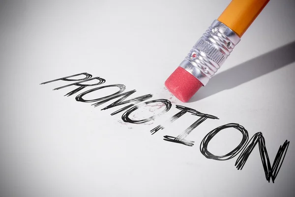 Pencil erasing the word Promotion — Stock Photo, Image