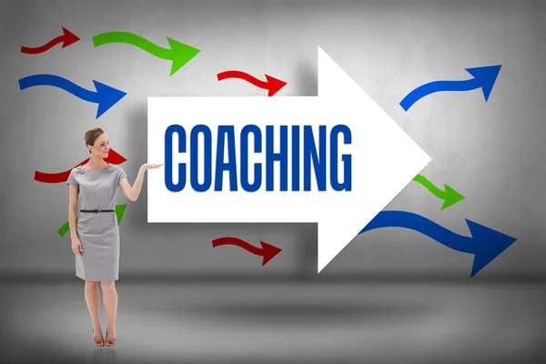 Coaching against arrows pointing — Stock Photo, Image