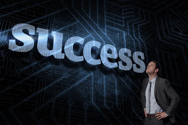 Success against futuristic black and blue background — Stock Photo, Image