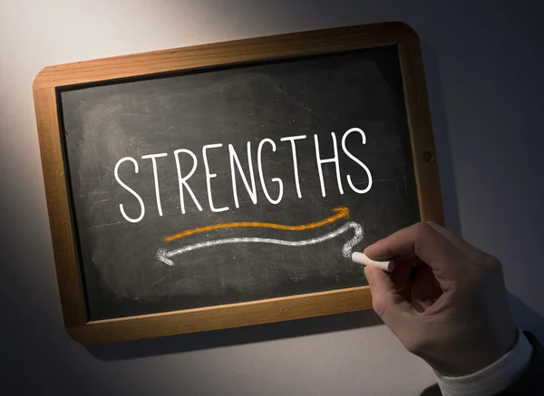 Hand writing Strengths on chalkboard — Stock Photo, Image