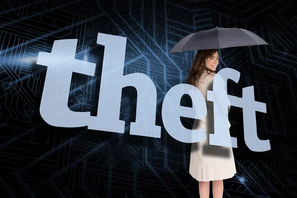 Businesswoman behind the word theft — Stock Photo, Image