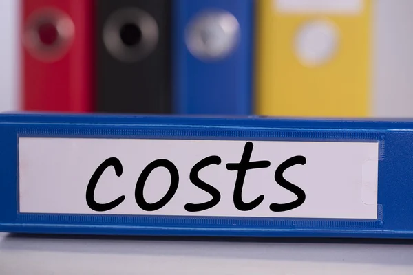 Costs on blue business binder — Stock Photo, Image