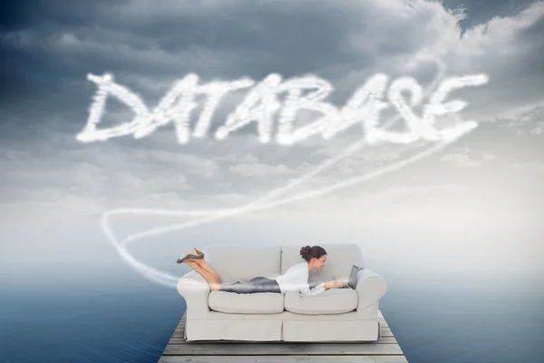 Database against cloudy sky over ocean — Stock Photo, Image