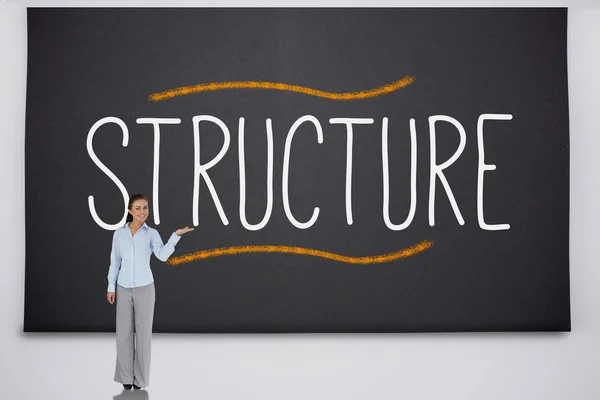 Empresaria presentando la palabra estructura — Foto de Stock