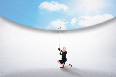 Businesswoman pulling down blue sky clipart