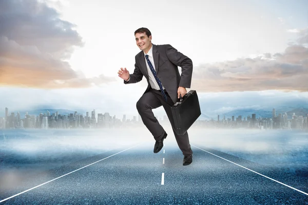 Cheerful businessman in a hurry — Stock Photo, Image