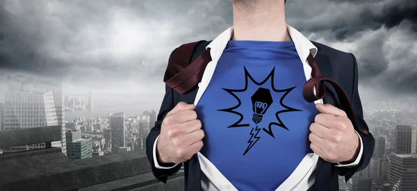 Businessman opening his shirt superhero style — Stock Photo, Image