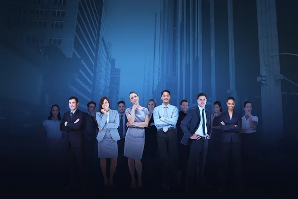 Business team against cityscape — Stock Photo, Image