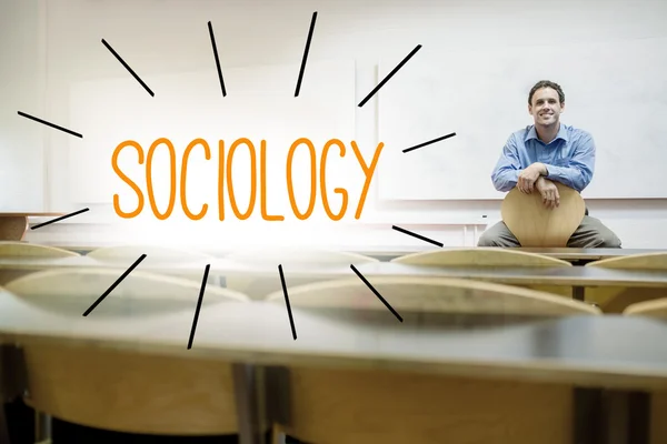 Sociology against lecturer sitting in lecture hall — Stock Photo, Image