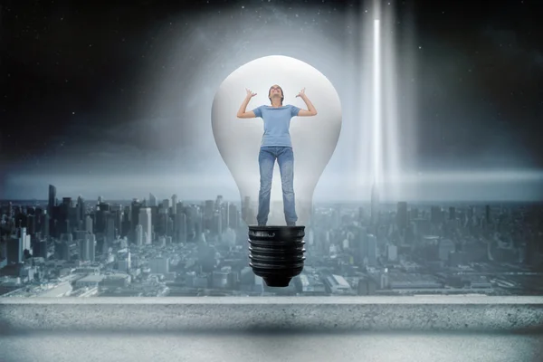 Angry woman in light bulb — Stock Photo, Image