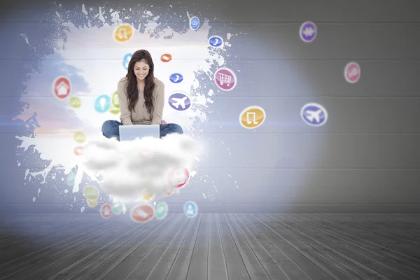 Brunette on floor using laptop — Stock Photo, Image