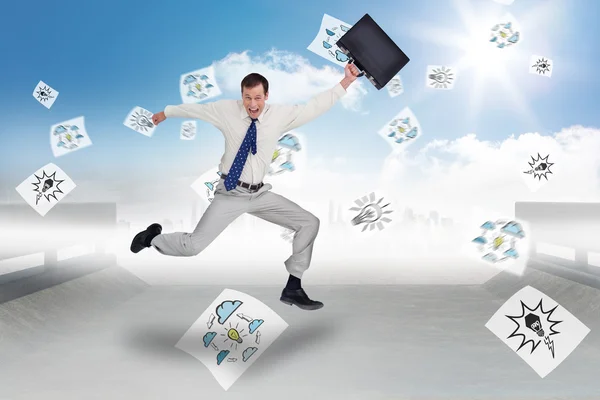 Jumping businessman with his suitcase — Stock Photo, Image