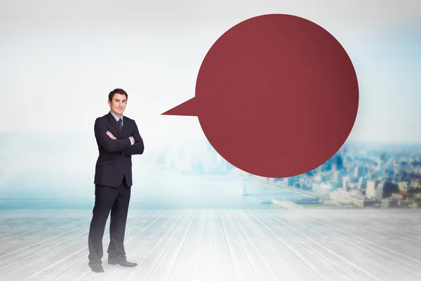 Businessman with speech bubble — Stock Photo, Image