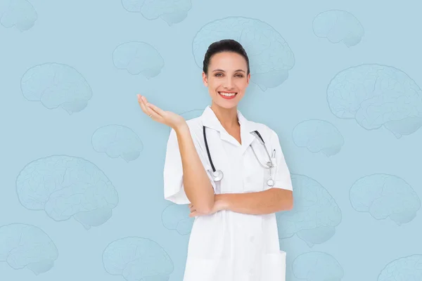 Pretty nurse presenting — Stock Photo, Image