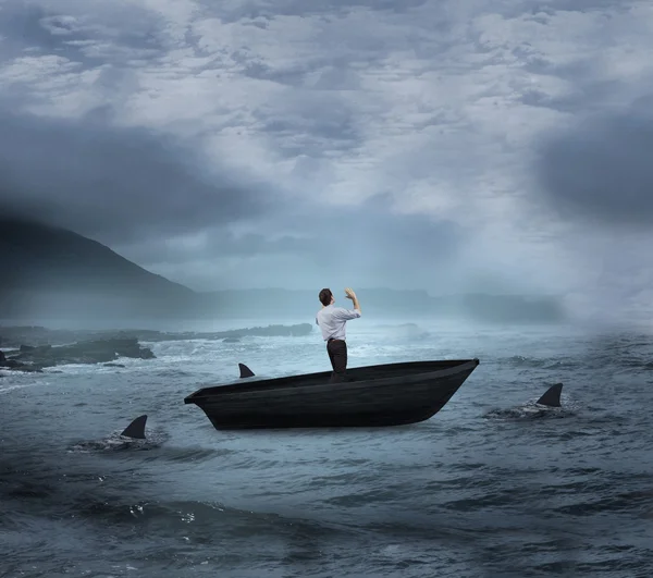 Businessman posing with arms up in a sailboat — Stock Photo, Image