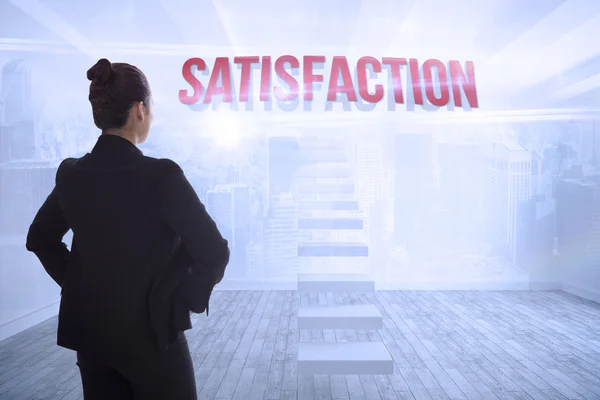 Satisfaction against city scene in a room — Stock Photo, Image