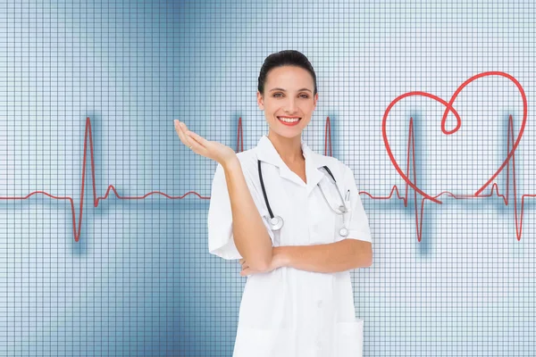 Pretty nurse presenting — Stock Photo, Image