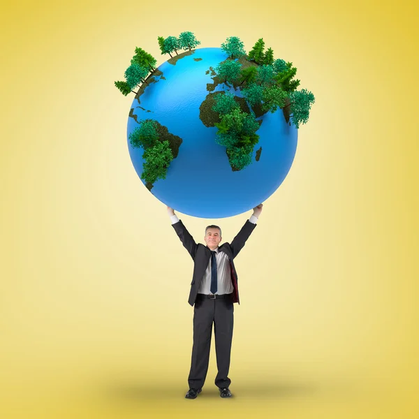 Businessman holding earth — Stock Photo, Image