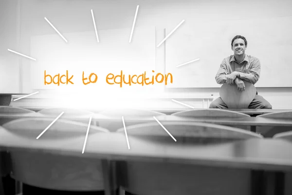 Back to education against lecturer sitting in lecture hall — Stock Photo, Image
