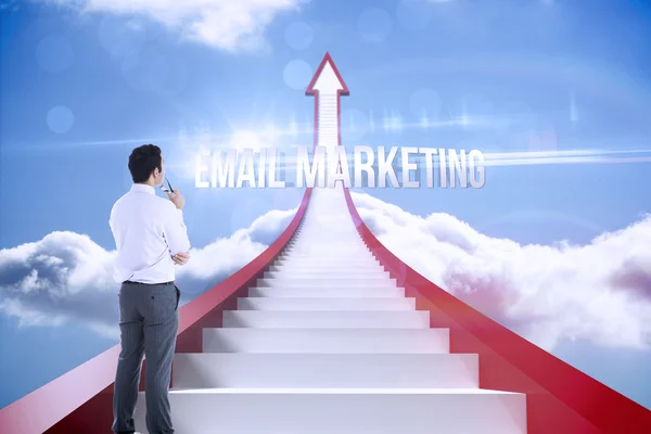 Email marketing against red steps arrow pointing up against sky — Stock Photo, Image