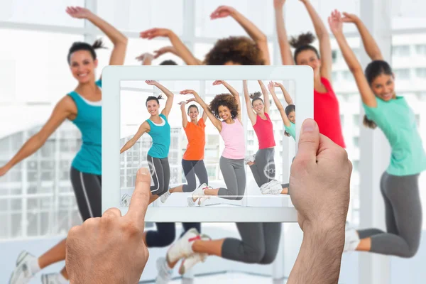 Hand som håller TabletPC — Stockfoto