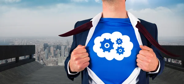 Businessman opening his shirt superhero style — Stock Photo, Image