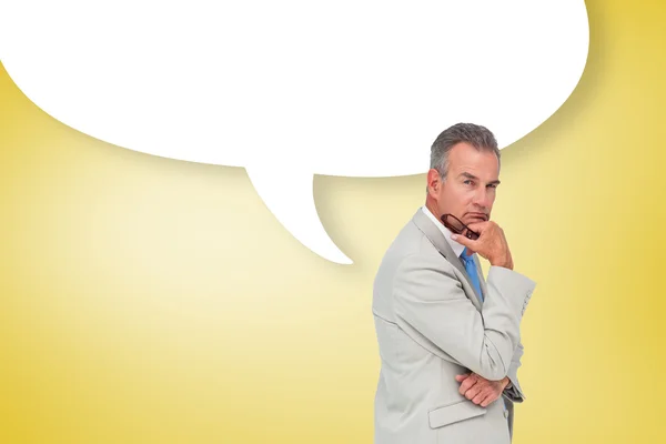 Businessman with speech bubble — Stock Photo, Image