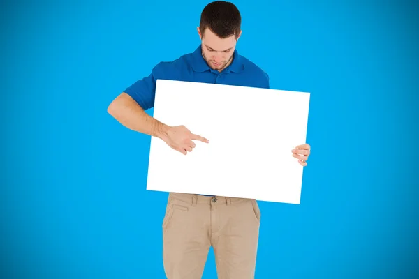 Handsome young man showing card — Stock Photo, Image