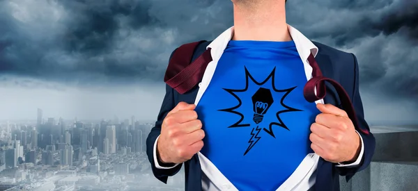 Businessman opening his shirt superhero style — Stock Photo, Image