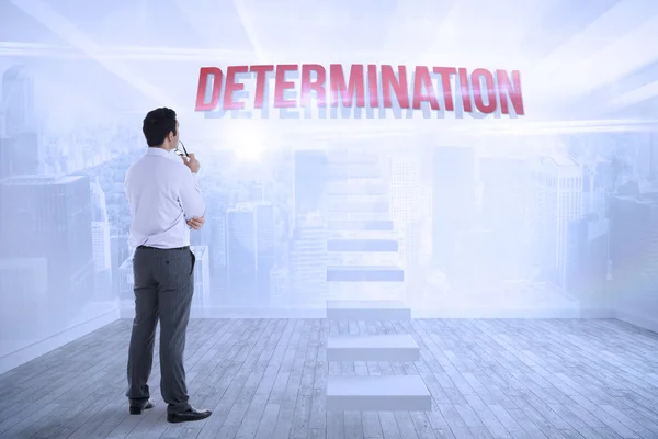 Determination against city scene in a room — Stock Photo, Image