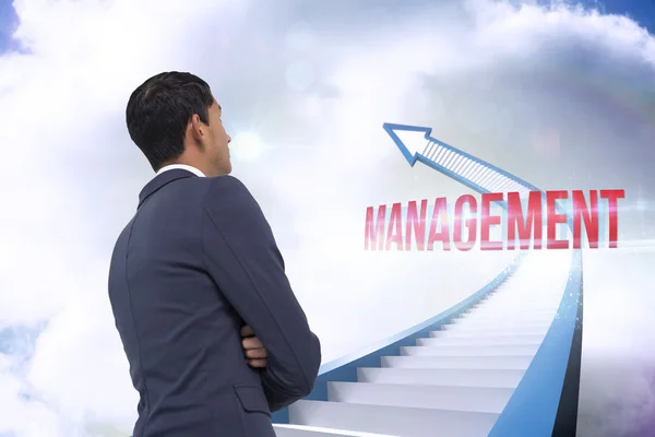 Management against red staircase arrow pointing up against sky — Stock Photo, Image