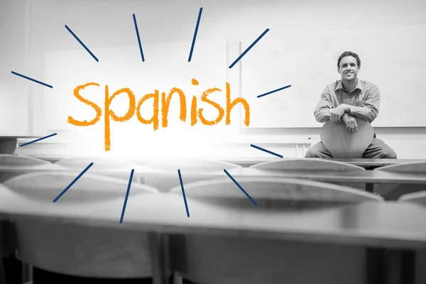 Spanish against lecturer sitting in lecture hall — Stock Photo, Image