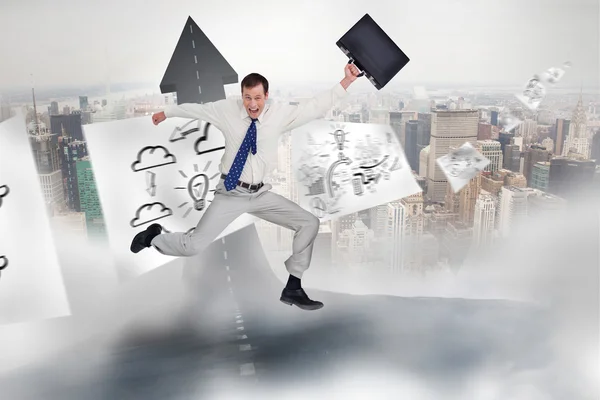 Jumping businessman with his suitcase — Stock Photo, Image