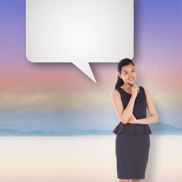 Asian businesswoman with speech bubble — Stock Photo, Image