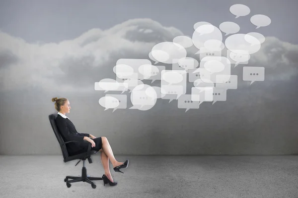 Businesswoman on swivel chair — Stock Photo, Image