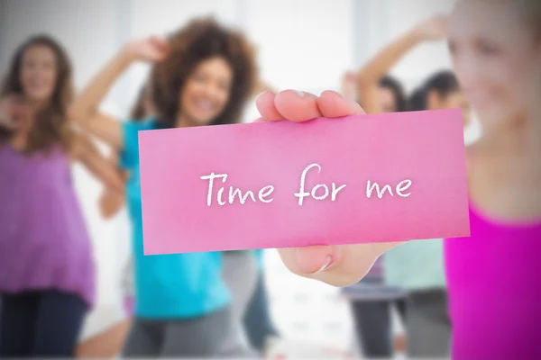 Woman holding pink card saying time for me — Stock Photo, Image