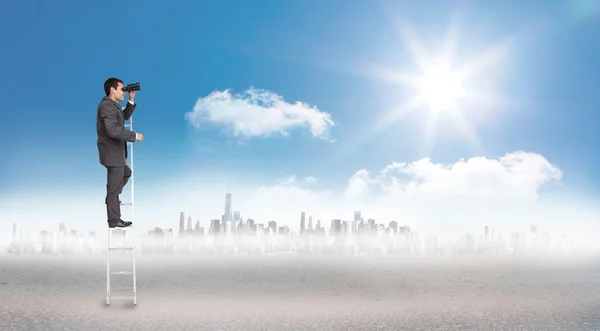 Businessman standing on ladder — Stock Photo, Image