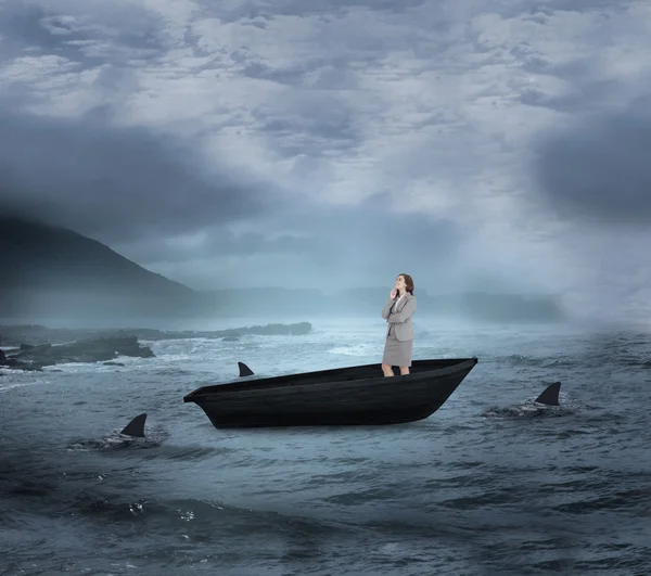 Thoughtful businesswoman in a sailboat — Stock Photo, Image