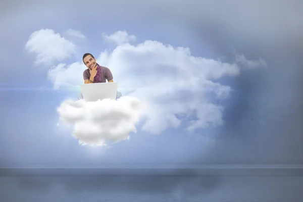 Man sitting on cloud  using laptop — Stock Photo, Image