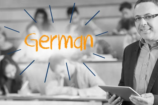 German against lecturer standing in front of his class in lecture hall — Stock Photo, Image